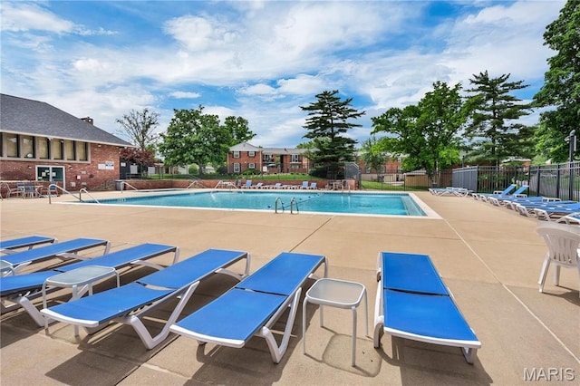 13489 Beaulac Dr, Chesterfield, MO 63141 - community pool featuring a patio area