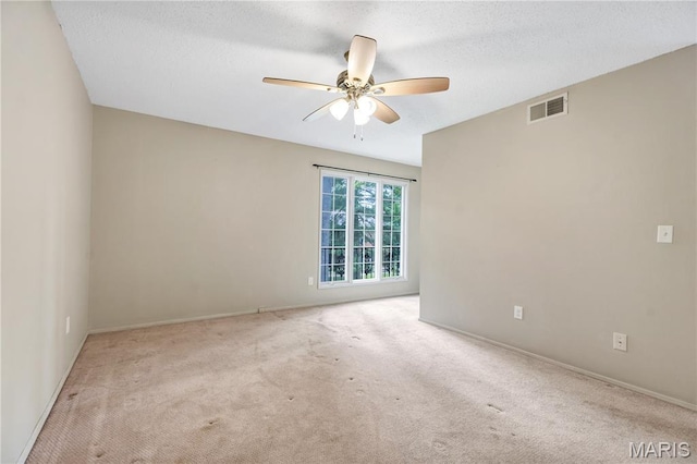 13489 Beaulac Dr, Chesterfield, MO 63141 - empty room with carpet, a ceiling fan, baseboards, and a textured ceiling