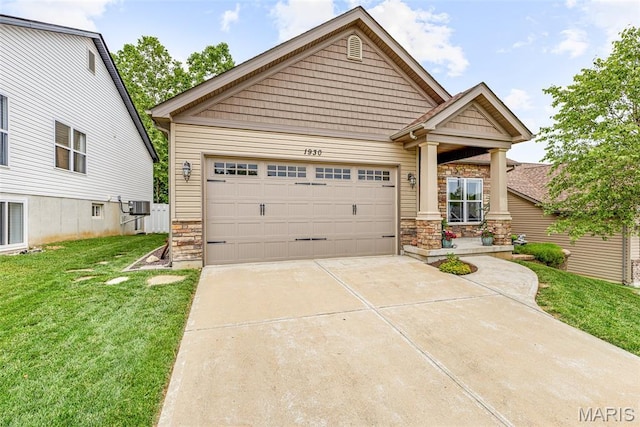 1930 Masters Dr, Festus, MO 63028 - craftsman-style house featuring stone siding, driveway, a front lawn, and an attached garage