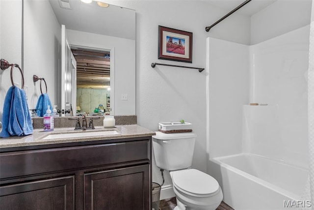 1930 Masters Dr, Festus, MO 63028 - full bathroom featuring toilet, vanity,  shower combination, and baseboards