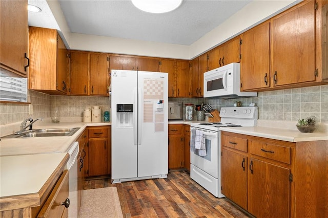 1505 Mulberry St, Jackson, MO 63755 - kitchen featuring white appliances, a sink, light countertops, and decorative backsplash