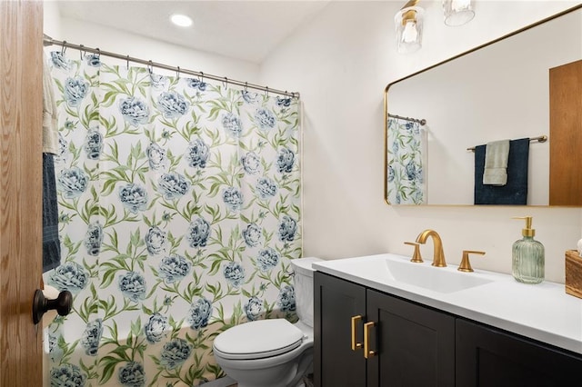 1505 Mulberry St, Jackson, MO 63755 - bathroom featuring toilet, vanity, curtained shower, and recessed lighting