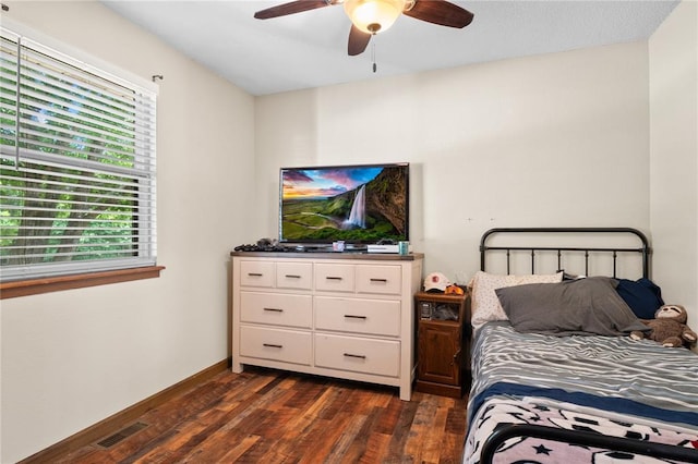 1505 Mulberry St, Jackson, MO 63755 - bedroom featuring dark wood-style floors, ceiling fan, and baseboards