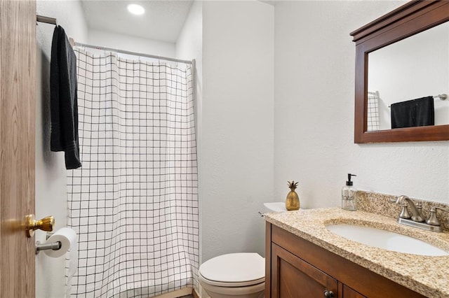 1505 Mulberry St, Jackson, MO 63755 - full bathroom with toilet, vanity, a shower with curtain, and a textured wall