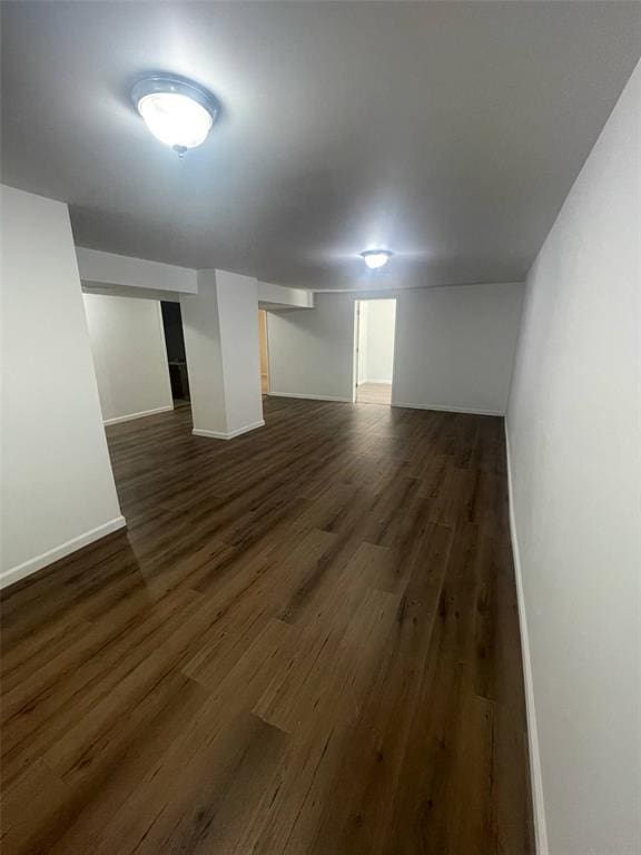 13103 Old 79, New London, MO 63459 - empty room with dark wood-style flooring and baseboards