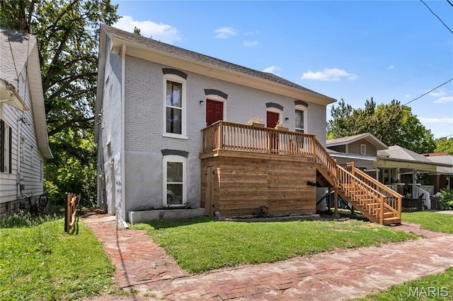 1217 E 5th St, Alton, IL 62002 - view of front of home with brick siding, stairway, and a front yard