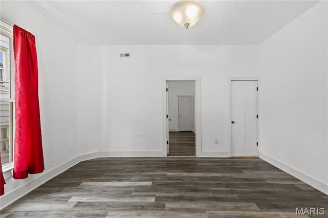 1217 E 5th St, Alton, IL 62002 - unfurnished room featuring wood finished floors and baseboards