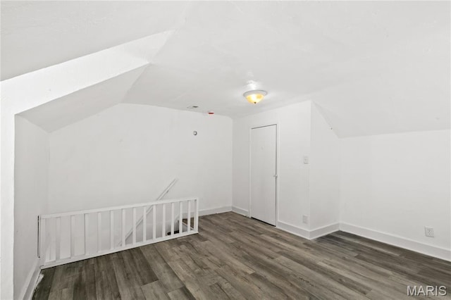 1217 E 5th St, Alton, IL 62002 - bonus room featuring vaulted ceiling, wood finished floors, and baseboards