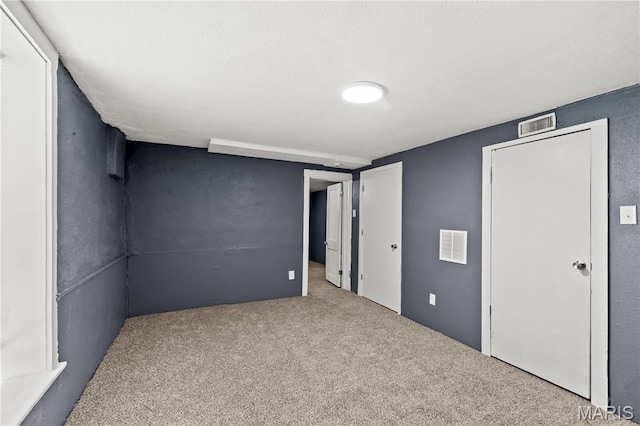 1217 E 5th St, Alton, IL 62002 - unfurnished bedroom featuring carpet