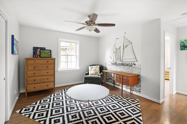 8033 Seminole Dr, Clayton, MO 63105 - sitting room with ceiling fan, wood finished floors, and baseboards