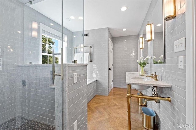 8033 Seminole Dr, Clayton, MO 63105 - bathroom with tile walls, a shower stall, and recessed lighting