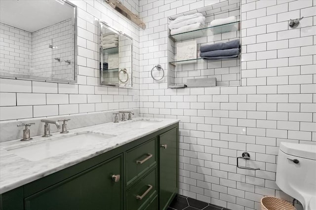 8033 Seminole Dr, Clayton, MO 63105 - full bath featuring tile walls, double vanity, and toilet