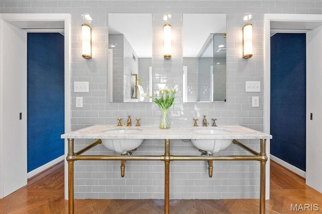 8033 Seminole Dr, Clayton, MO 63105 - bathroom with baseboards and double sink