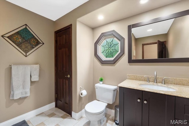 3536 Possum Ridge Dr, Imperial, MO 63052 - bathroom with toilet, vanity, and baseboards