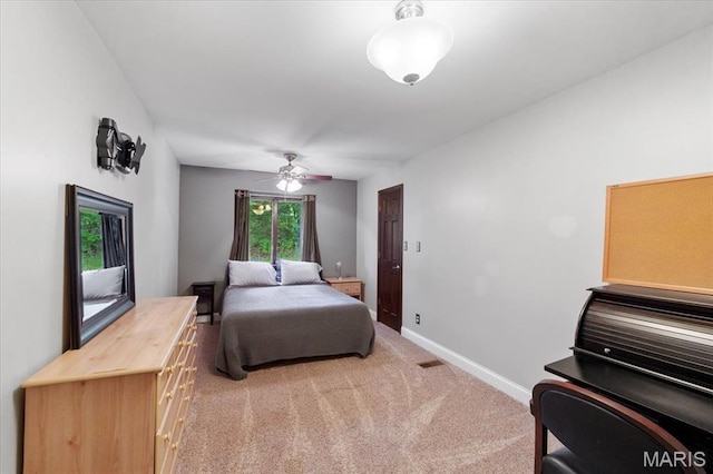 3536 Possum Ridge Dr, Imperial, MO 63052 - bedroom featuring light carpet, baseboards, and a ceiling fan