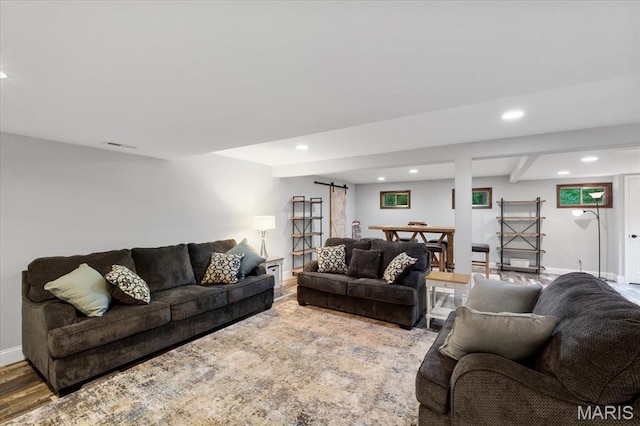 3536 Possum Ridge Dr, Imperial, MO 63052 - living area with a barn door, recessed lighting, baseboards, wood finished floors, and beamed ceiling