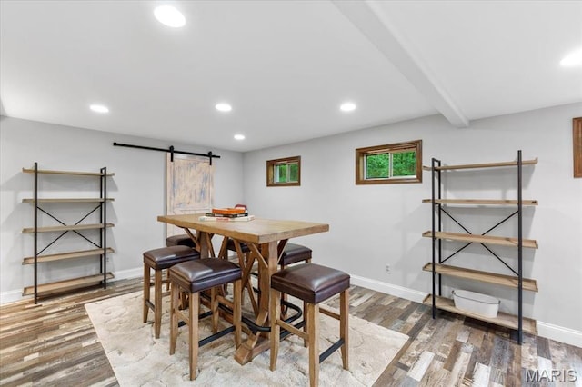 3536 Possum Ridge Dr, Imperial, MO 63052 - dining area with a barn door, wood finished floors, baseboards, and recessed lighting