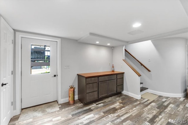 3536 Possum Ridge Dr, Imperial, MO 63052 - entryway featuring wood finished floors, stairs, baseboards, and recessed lighting