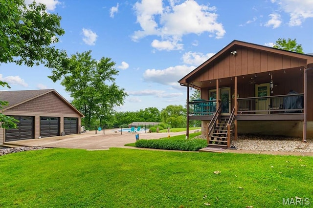 3536 Possum Ridge Dr, Imperial, MO 63052 - view of grassy yard featuring stairway, an outdoor pool, a garage, and a patio area