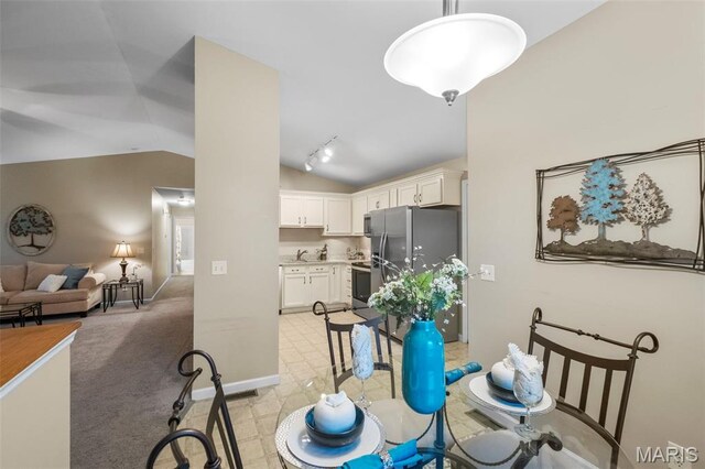 30 Citori Ct, Troy, MO 63379 - dining space with lofted ceiling and baseboards