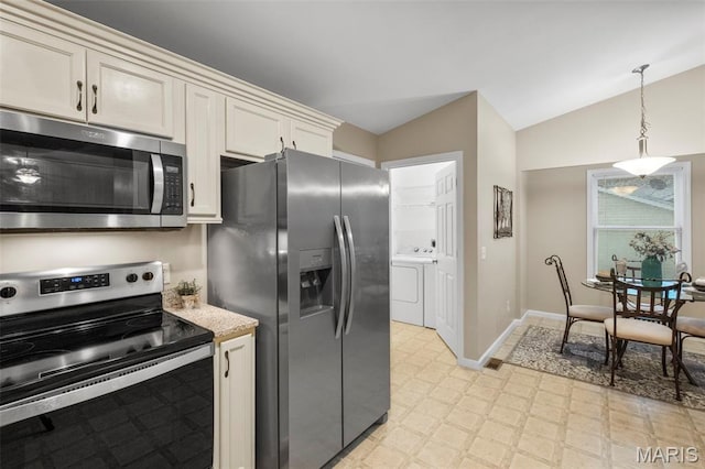 30 Citori Ct, Troy, MO 63379 - kitchen with stainless steel appliances, light floors, vaulted ceiling, washer and dryer, and pendant lighting