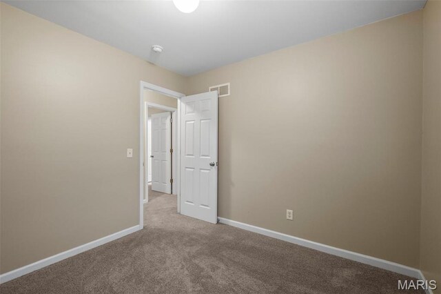 30 Citori Ct, Troy, MO 63379 - empty room with carpet flooring, baseboards, and a smoke detector
