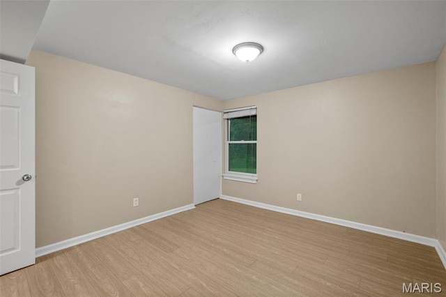 30 Citori Ct, Troy, MO 63379 - empty room featuring light wood-style floors and baseboards