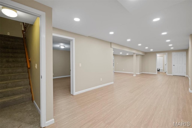 30 Citori Ct, Troy, MO 63379 - finished basement featuring stairs, baseboards, light wood-style floors, and recessed lighting