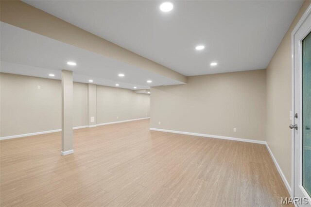 30 Citori Ct, Troy, MO 63379 - finished basement with light wood finished floors, baseboards, and recessed lighting