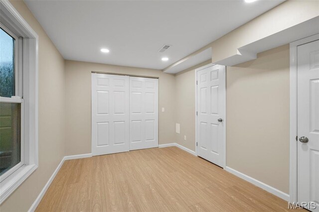 30 Citori Ct, Troy, MO 63379 - unfurnished bedroom with light wood-type flooring, baseboards, and recessed lighting