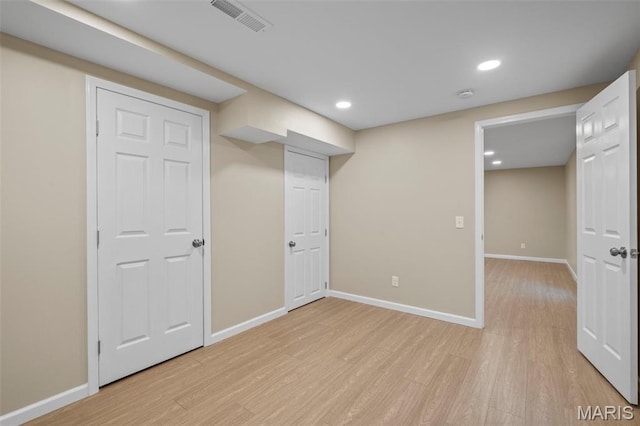 30 Citori Ct, Troy, MO 63379 - finished below grade area with light wood-style floors, baseboards, and recessed lighting