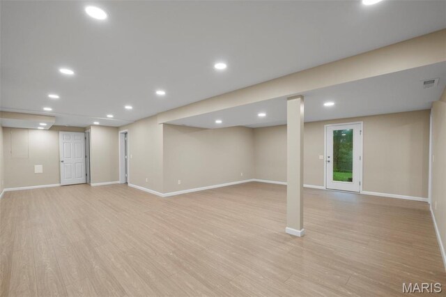 30 Citori Ct, Troy, MO 63379 - finished below grade area featuring baseboards, light wood-type flooring, and recessed lighting