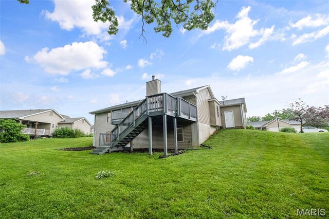 30 Citori Ct, Troy, MO 63379 - rear view of house with stairway, a wooden deck, a lawn, and a chimney