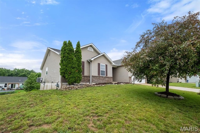 171 Majestic Lakes Blvd, Moscow Mills, MO 63362 - view of front of property with a front lawn, brick siding, and a garage