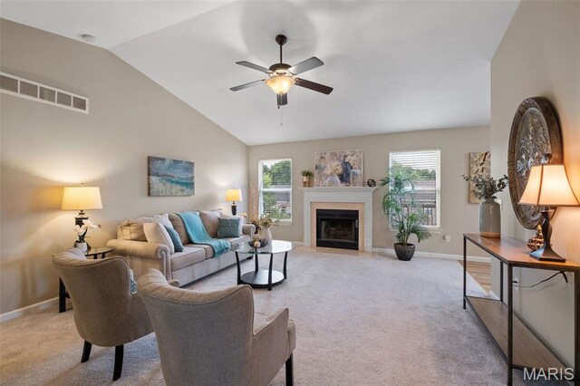 171 Majestic Lakes Blvd, Moscow Mills, MO 63362 - living area featuring ceiling fan, light colored carpet, baseboards, plenty of natural light, and vaulted ceiling