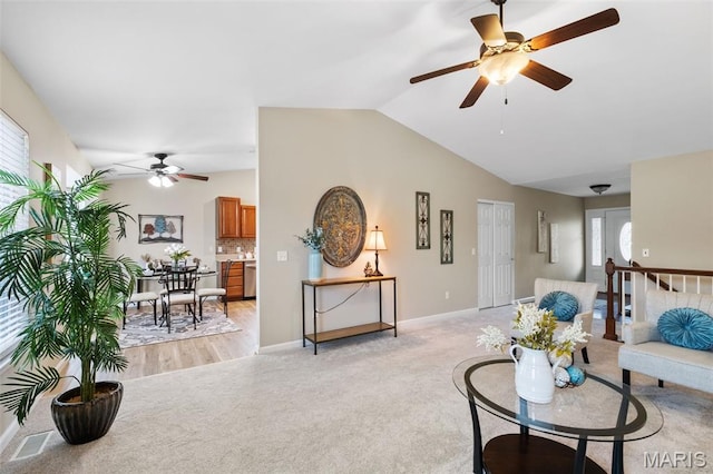 171 Majestic Lakes Blvd, Moscow Mills, MO 63362 - living area with a ceiling fan, light carpet, lofted ceiling, and baseboards