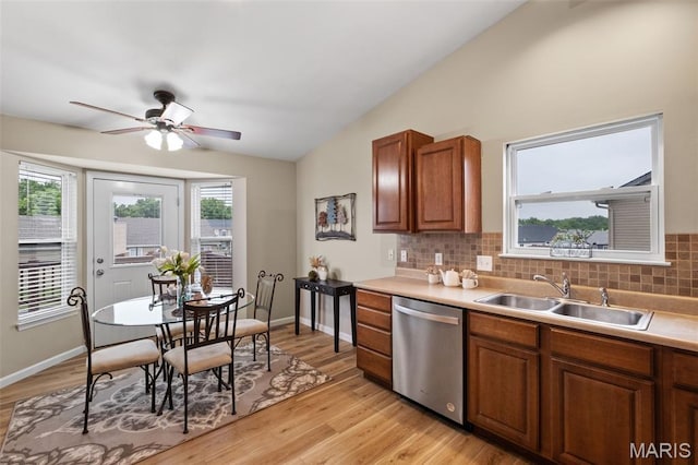 171 Majestic Lakes Blvd, Moscow Mills, MO 63362 - kitchen featuring dishwasher, a sink, vaulted ceiling, tasteful backsplash, and ceiling fan