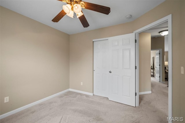 171 Majestic Lakes Blvd, Moscow Mills, MO 63362 - unfurnished bedroom with carpet flooring, baseboards, a closet, and ceiling fan