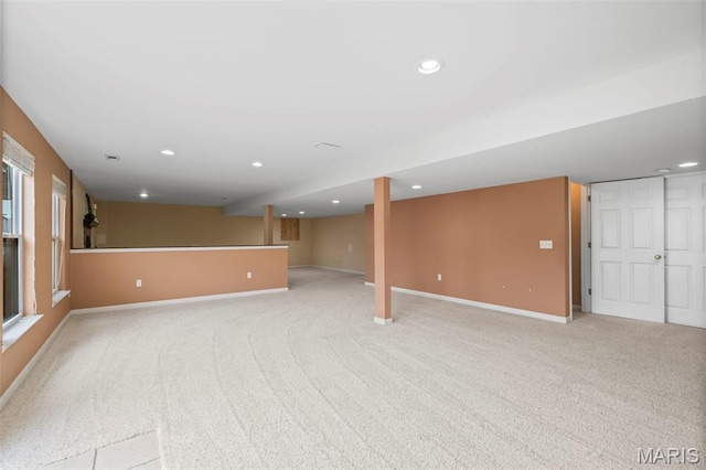171 Majestic Lakes Blvd, Moscow Mills, MO 63362 - below grade area featuring light carpet, baseboards, and recessed lighting