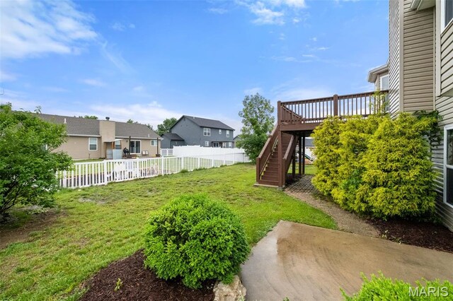 171 Majestic Lakes Blvd, Moscow Mills, MO 63362 - view of yard with stairway, a residential view, a wooden deck, and a patio area