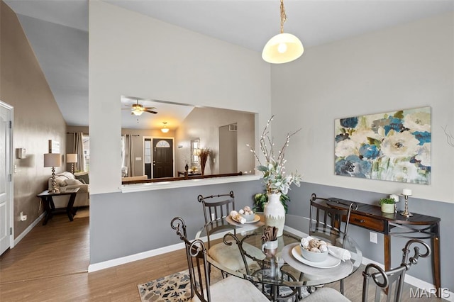 2231 Central Park Dr, Troy, MO 63379 - dining space featuring wood finished floors, baseboards, and a ceiling fan