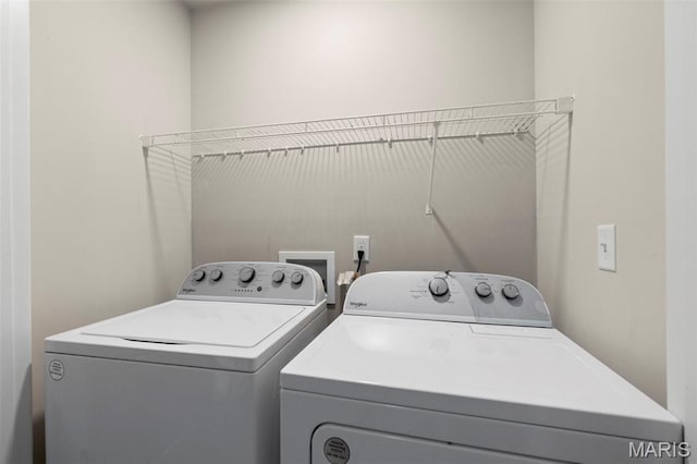 2231 Central Park Dr, Troy, MO 63379 - laundry room with washing machine and clothes dryer