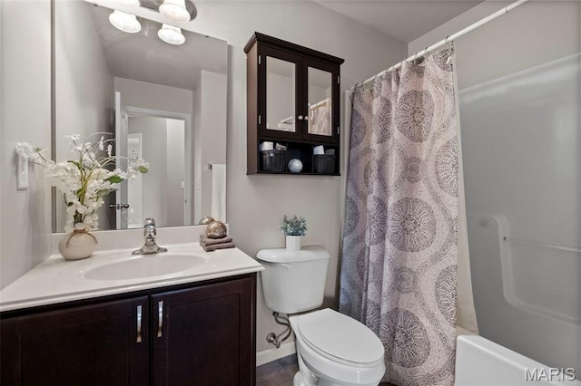 2231 Central Park Dr, Troy, MO 63379 - full bath featuring vanity, toilet, and shower / bath combo with shower curtain