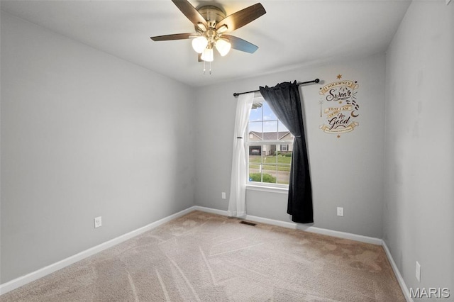 2231 Central Park Dr, Troy, MO 63379 - empty room with light carpet, ceiling fan, and baseboards