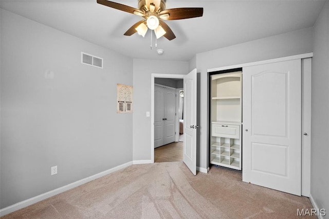 2231 Central Park Dr, Troy, MO 63379 - unfurnished bedroom featuring carpet floors, baseboards, a ceiling fan, and a closet
