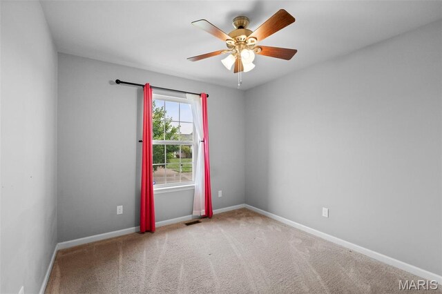 2231 Central Park Dr, Troy, MO 63379 - carpeted spare room with ceiling fan and baseboards