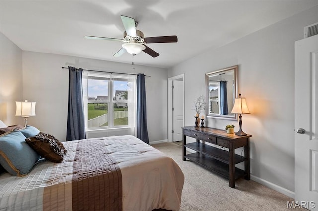 2231 Central Park Dr, Troy, MO 63379 - bedroom with light carpet, baseboards, and a ceiling fan