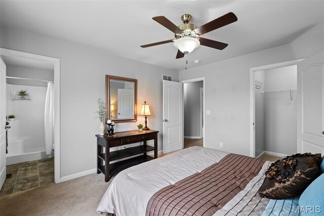 2231 Central Park Dr, Troy, MO 63379 - carpeted bedroom featuring baseboards, a closet, ensuite bath, and ceiling fan