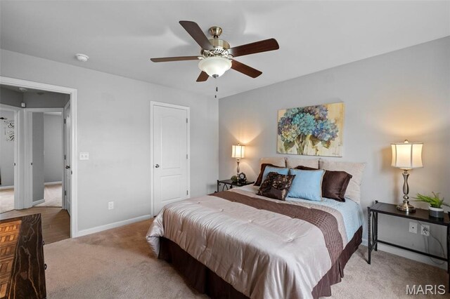 2231 Central Park Dr, Troy, MO 63379 - carpeted bedroom featuring baseboards and ceiling fan