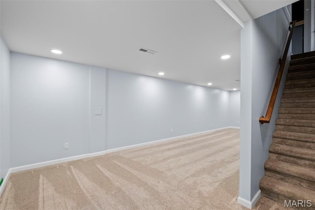 2231 Central Park Dr, Troy, MO 63379 - finished below grade area featuring carpet floors, stairway, recessed lighting, and baseboards